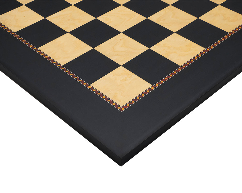 The Queen's Gambit black dyed poplar and ash root chess board with detailed design, crafted by Rechapados Ferrer in Spain.