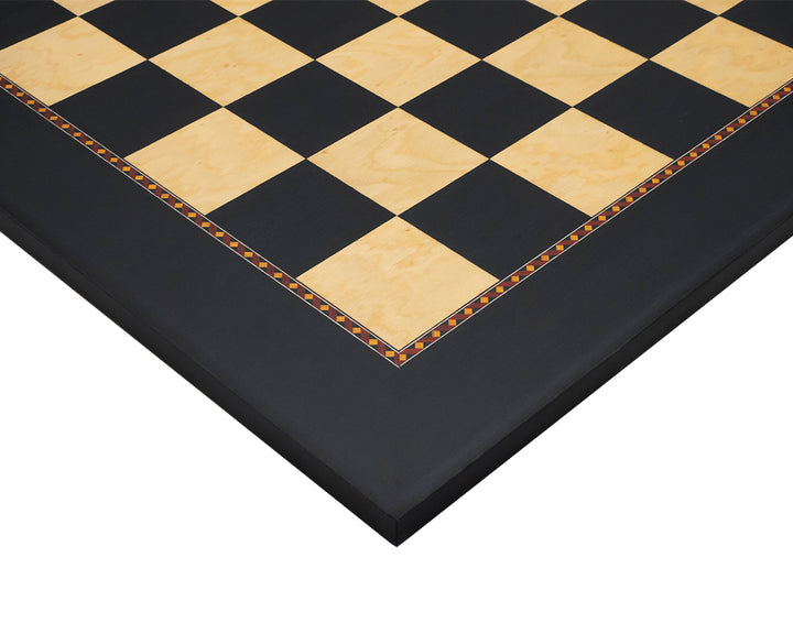 The Queen's Gambit black dyed poplar and ash root chess board with detailed design, crafted by Rechapados Ferrer in Spain.