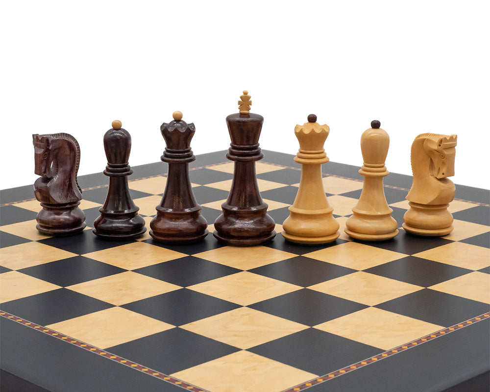 The Queens Gambit chess set with solid rosewood Staunton chessmen on a contrasting 19.7-inch board, featuring exquisite handcrafted details.