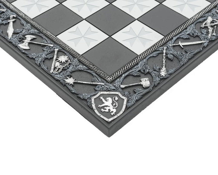 Detailed corner view of 17.7 inch Templar hand-painted resin chessboard featuring medieval weapon relief designs embossed on the border.