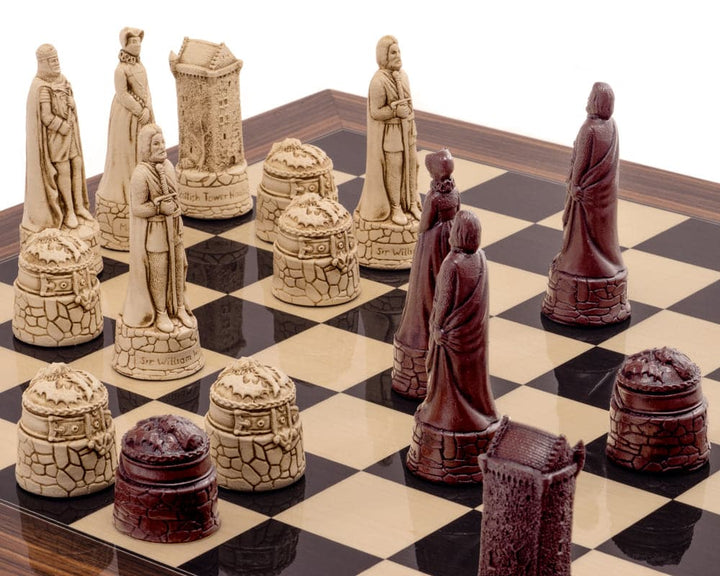 Scottish Russet Chess Men on chessboard, intricately sculpted figurines in deep russet and cream-colored finish, historical designs.