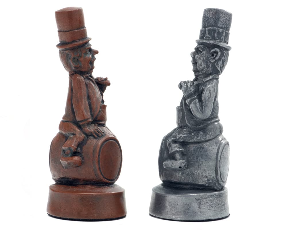 Handmade Berkeley Chess Movie Stars metallic chess pieces featuring two finely detailed figurines on stone resin bases.