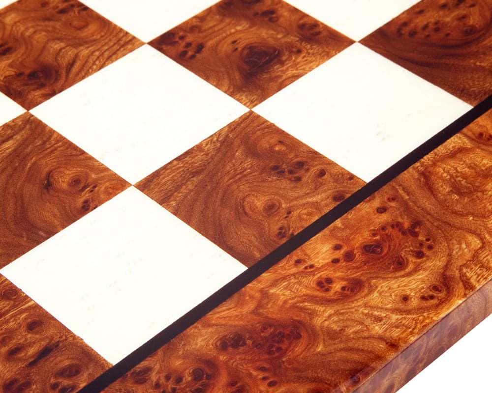 Close-up of high gloss 23.6-inch briarwood and elmwood luxury chess board, featuring 2.36-inch playing squares, crafted in Italy.