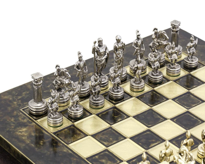 Greek Roman Army metal chess set with detailed brass and nickel plated pieces on wooden board