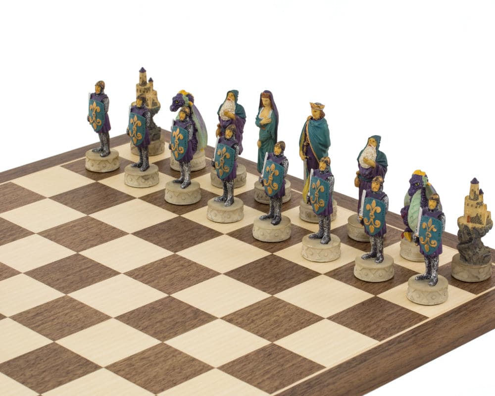 Medieval-themed hand-painted chess pieces in blue and purple by Italfama, set up on a chessboard.