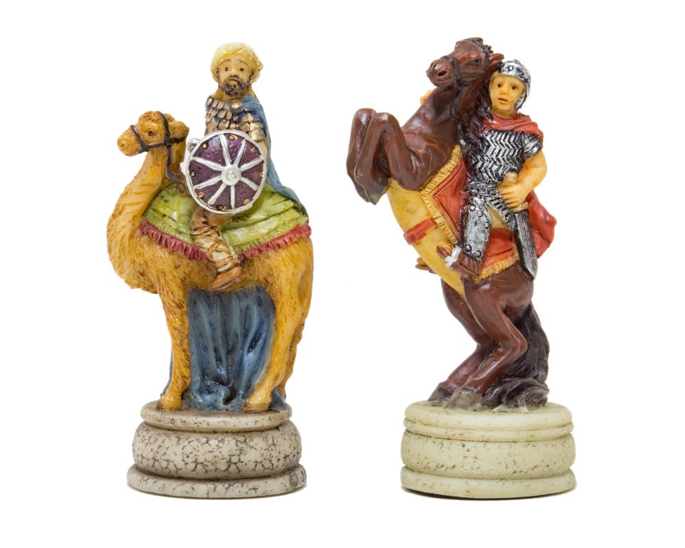 Hand painted Romans vs Arabs chess pieces by Italfama, featuring a Roman soldier on a horse and an Arab warrior on a camel.