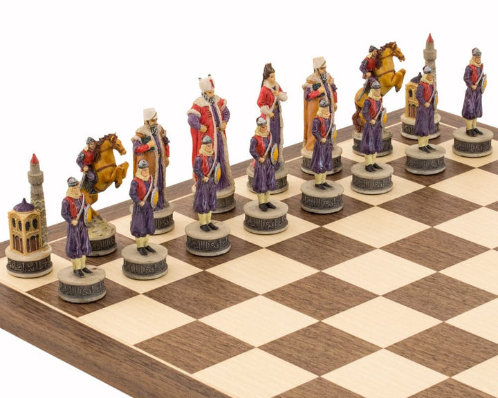 Hand painted Hungarians vs Turkish themed chess pieces by Italfama on a wooden chessboard.