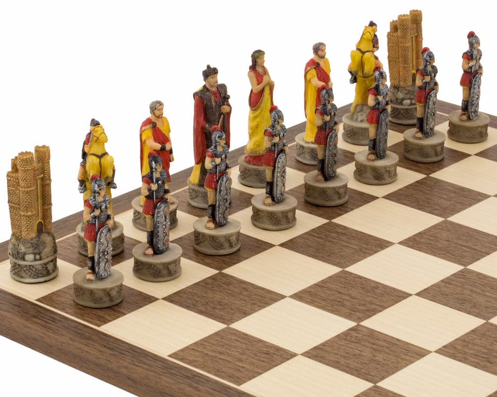 The Battle of Troy hand-painted themed chess pieces by Italfama featuring Greek and Spartan armies on a chessboard.