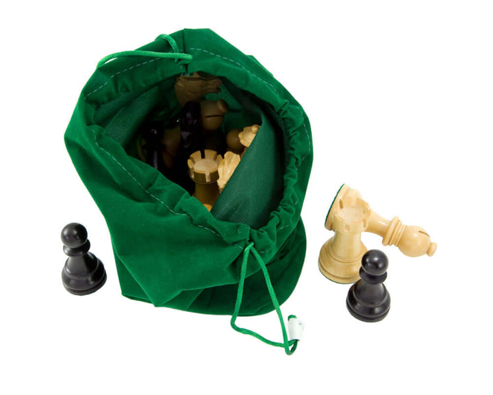 Green drawstring bag for chess pieces, made of luxurious corded emerald fabric, with a partially open top showing chess pieces inside