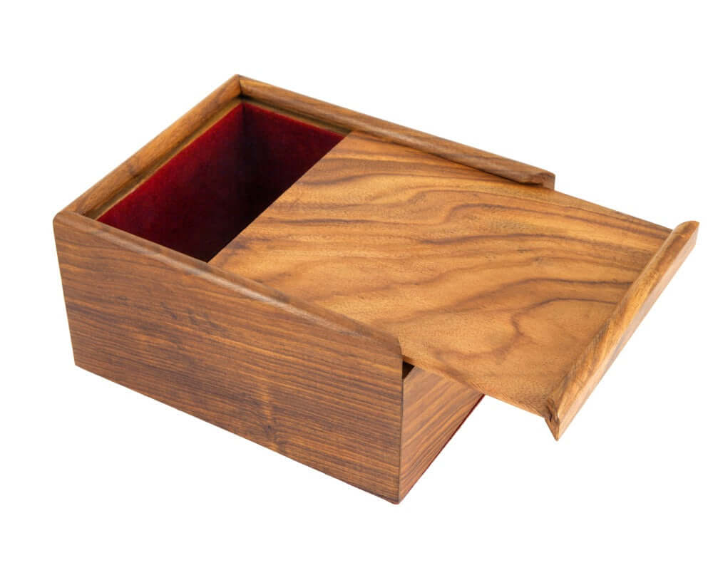 Wooden chess piece case with sliding lid and luxurious deep grain exotic hardwood shown open with red interior