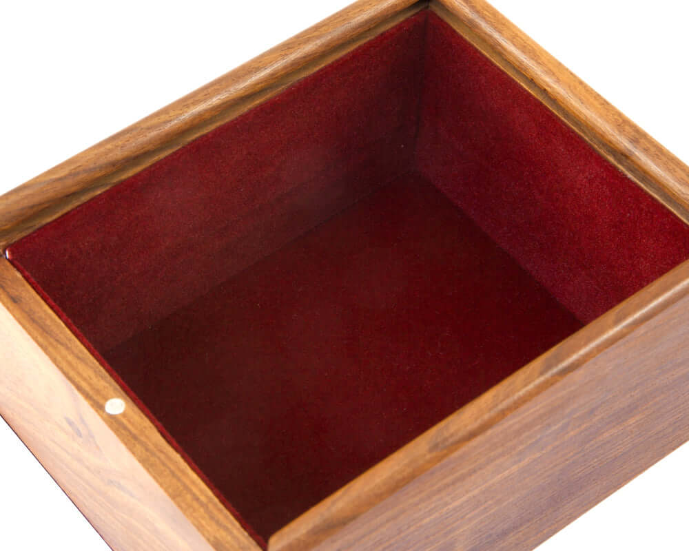 Interior of wooden chess piece case with luxurious red lining and sliding lid, showcasing its deep grain and magnetic fixing mechanism.