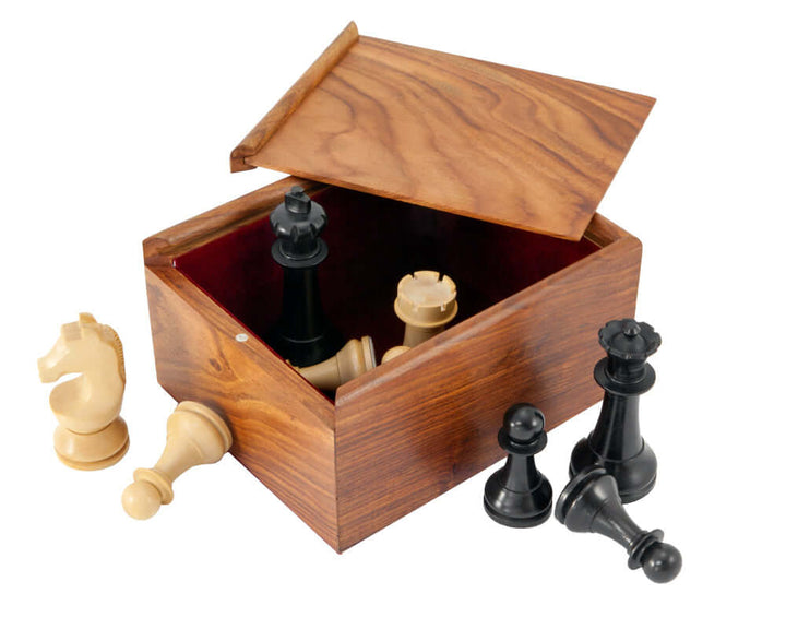 Wooden chess piece case with sliding lid and chess pieces, crafted from exotic hardwood with deep grain for luxurious and durable protection.