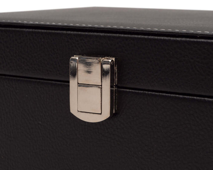 Black leatherette chess piece case with chrome clasp and cushioned compartments