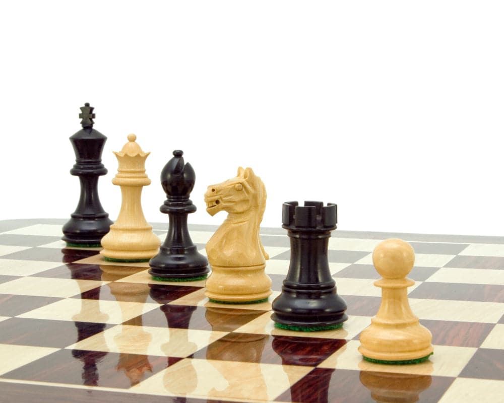 Fierce Knight Ebonised Staunton Chessmen set on a chessboard, featuring 3-inch handcrafted, weighted Boxwood pieces in classic Staunton design.