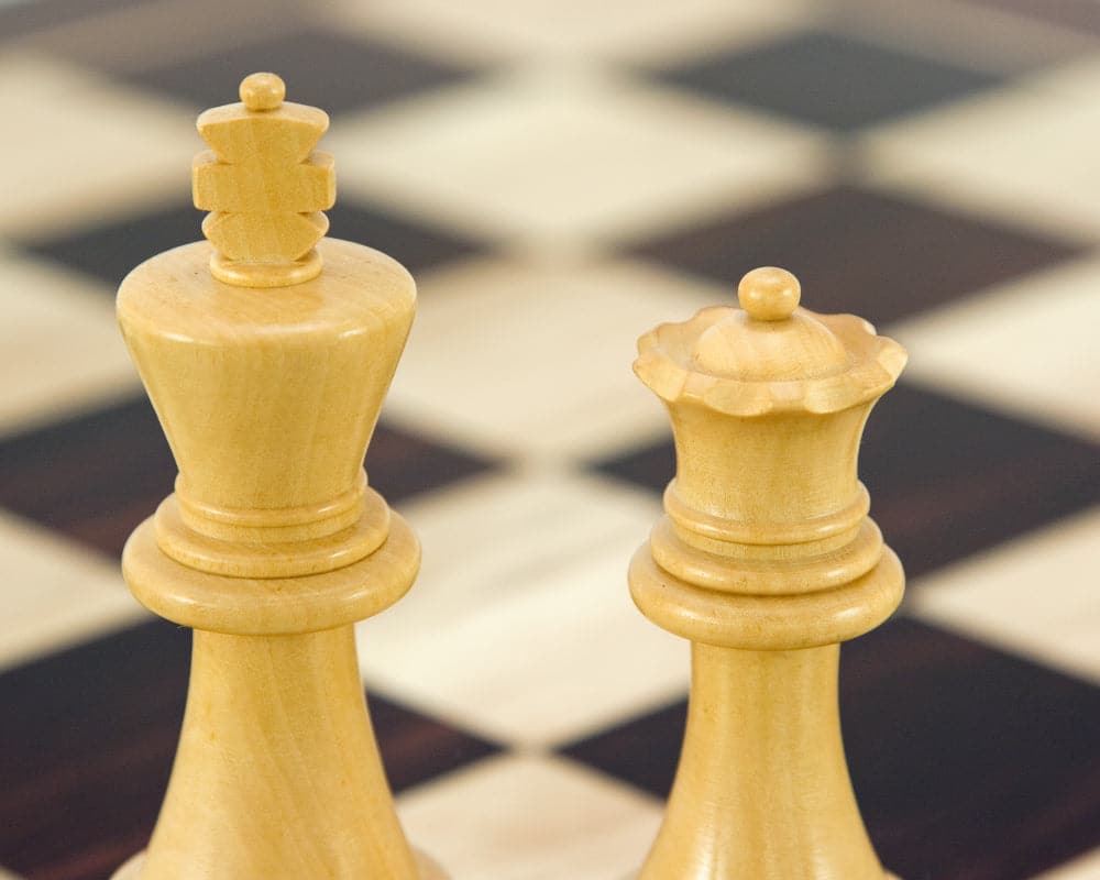 Ebonised boxwood king and queen chess pieces on a chessboard from Frankfurt Series