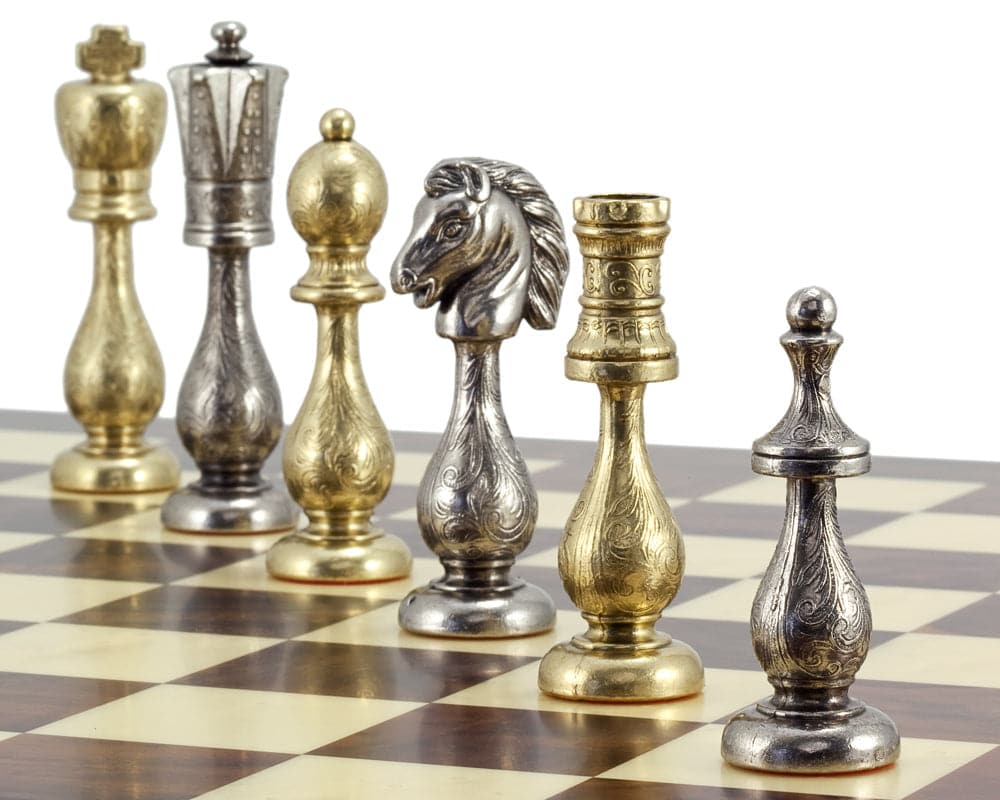 Maghreb Brass and Nickel Chess Pieces 4 Inches with intricate filigree detail, crafted in Italy, displayed on a chessboard.