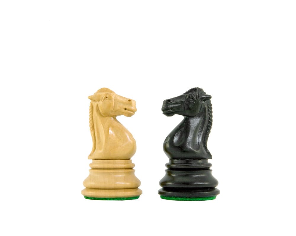 Handcrafted ebony and boxwood knight chess pieces from Cheltenham Series, featuring detailed design and felted bases for perfect balance