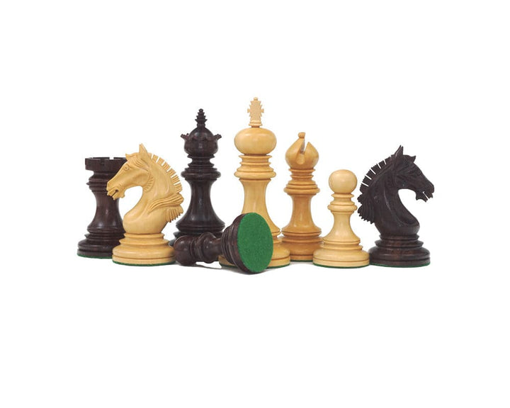 Luxury Staunton Garvi 4.25-inch rosewood chessmen set with intricate hand-carved Mughal-inspired design displayed on white background