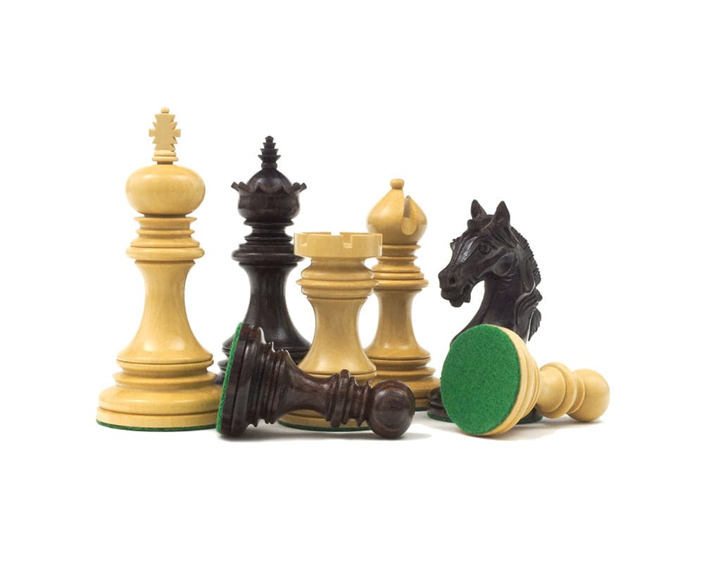 Luxury Staunton Garvi 4.25 inch Rosewood Chessmen showcasing intricate Mughal-influenced carvings, beautifully crafted for elegance and exclusivity.