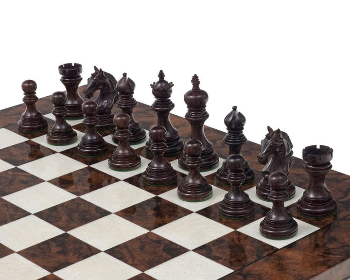 Luxury Staunton Garvi 4.25-inch Rosewood Chessmen set up on a chessboard, showcasing intricate hand-carved details.