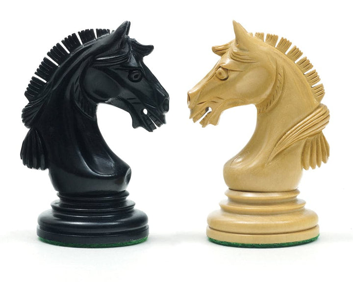 Black and white knight chess pieces from The Garvi Ebony Chessmen set with distinct Mughal designs and intricate details.