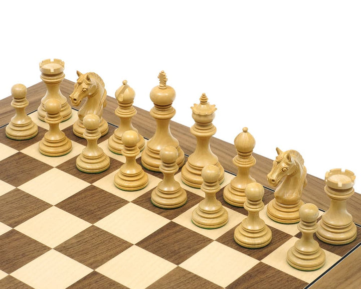 The Garvi Ebony Chessmen 4 Inches set on a chessboard with distinctively Staunton and Mughal influenced design.