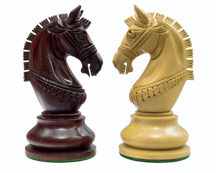 Handcrafted La Valletta Redwood Chessmen knights showcasing detailed Maltese design, one in dark redwood, the other in light wood.