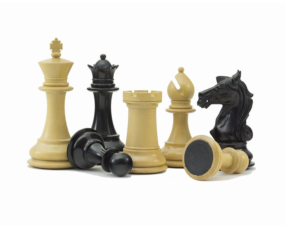 Columbus Series Chessmen Ebony 4" set, featuring decorative Staunton design and expertly crafted pieces, ideal for a 21.7 inch board.