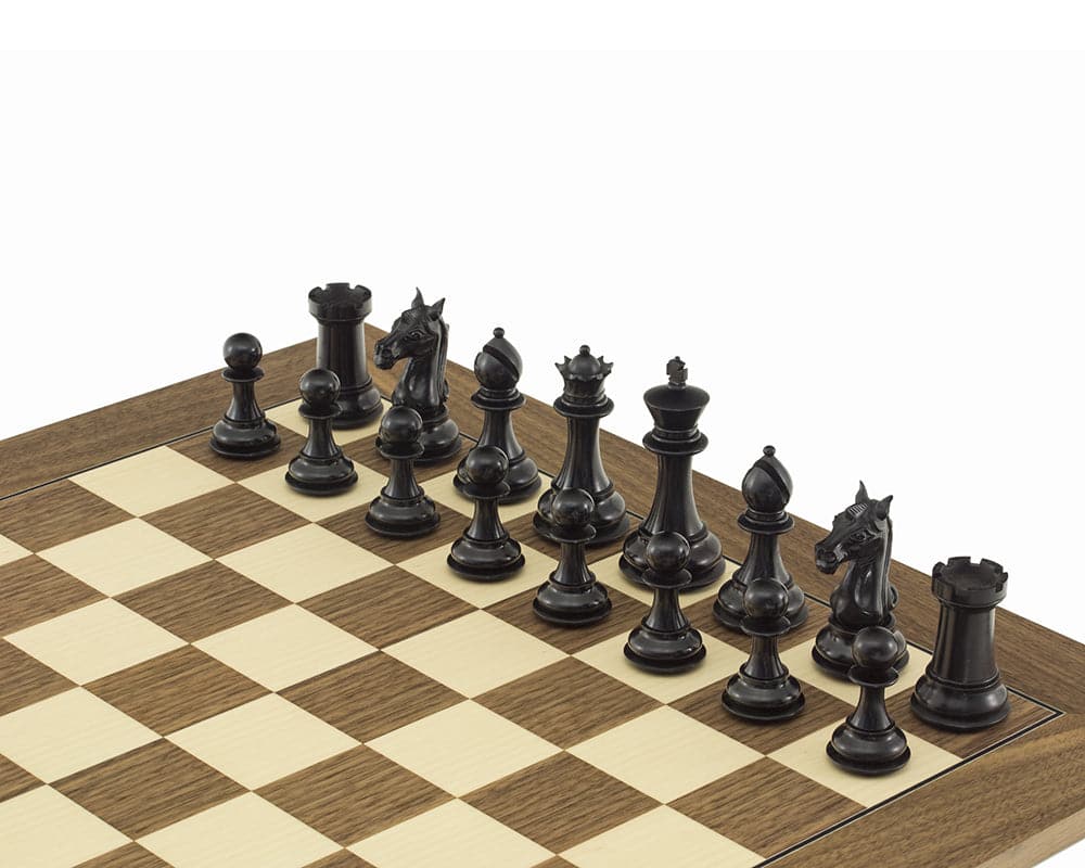 Columbus Series Chessmen Ebony 4" Staunton design on chessboard. Premium ebony wood pieces with 4-inch King. Ideal for 21.7-inch board.