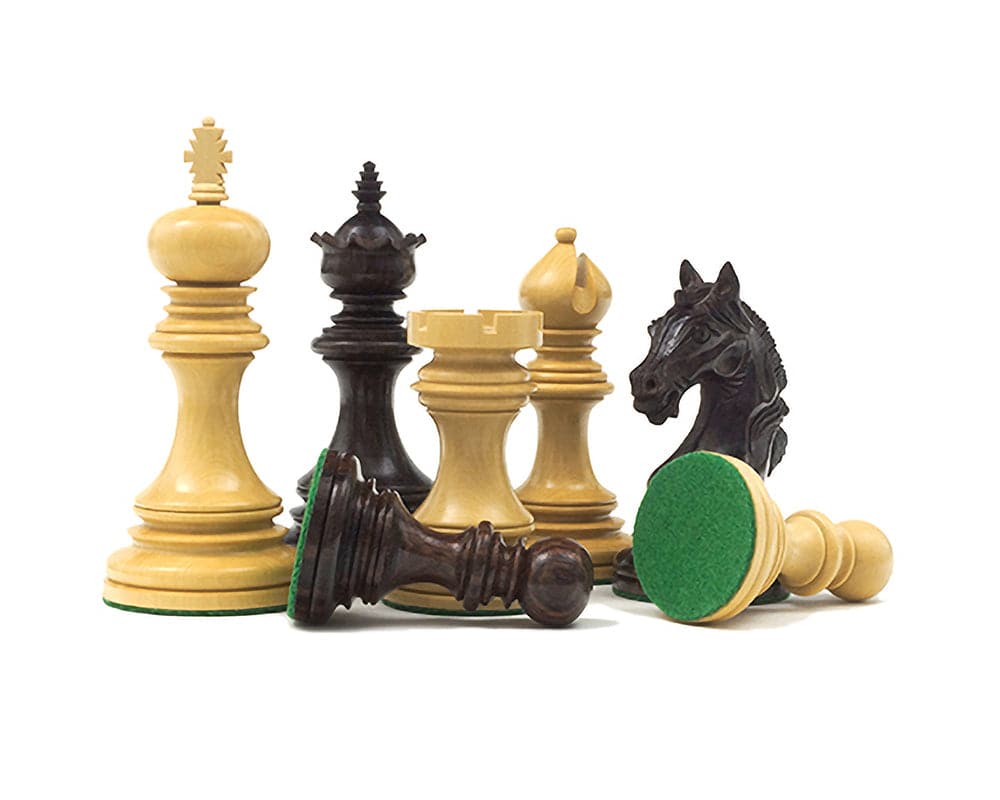 The Garvi 4 inch Rosewood Chessmen, including the 4-inch king and intricately crafted pieces with green billiard cloth bases.