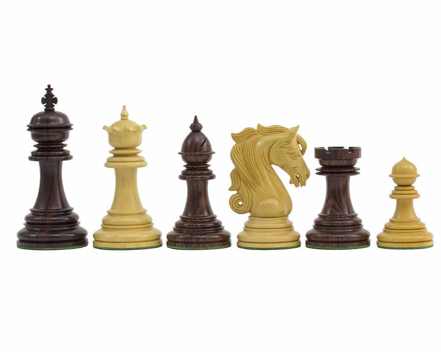 The Kingsgate Rosewood Chessmen 4.25 inch set with ornate detailing and 2 additional queens, ideal for a 21.7 inch board.