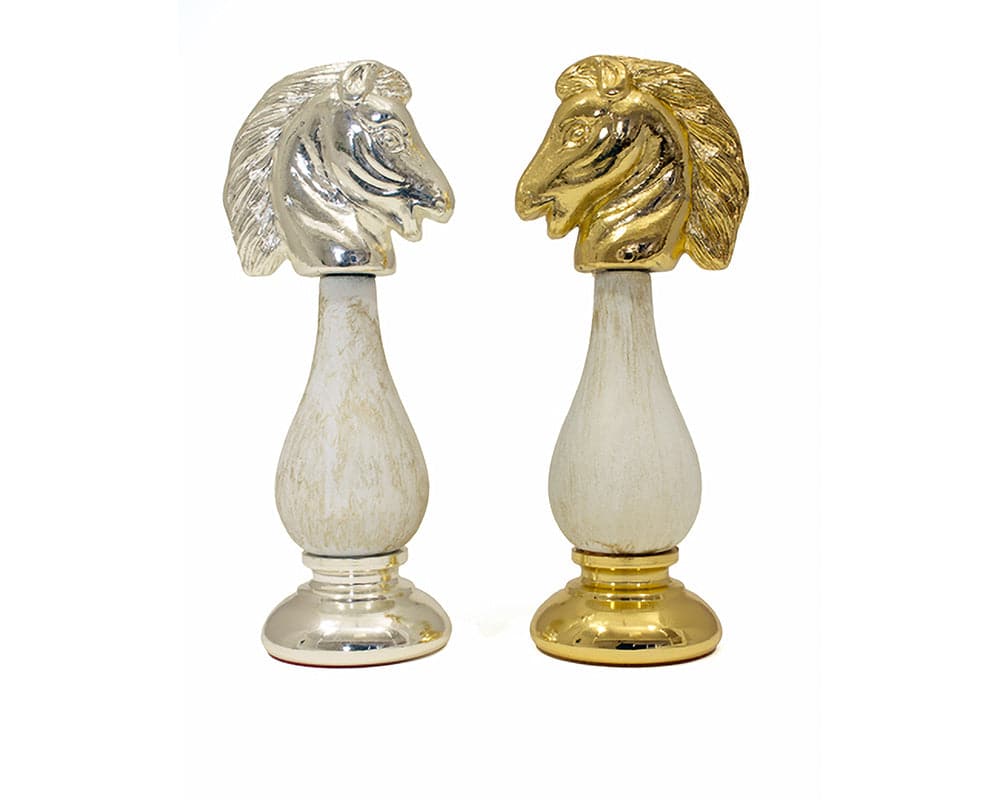 The San Severeo 24 Carat Gold and 990 Silver Plated Chessmen, crafted in Italy, display intricate horse head details, ideal for a 17" board.