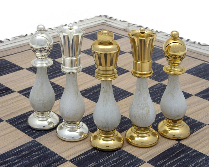 Close-up of San Severeo 24 Carat Gold and 990 Silver Plated Chessmen on a chessboard, featuring luxurious and meticulously crafted pieces.