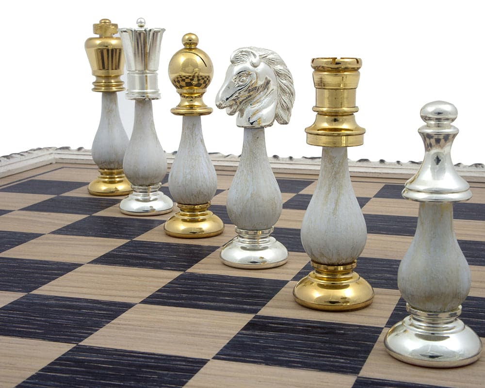 The San Severeo 24 Carat Gold and 990 Silver Plated Chessmen on a chessboard highlighting detailed crafted pieces