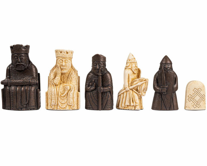 Official Lewis Chessmen Set pieces including King, Queen, Bishop, and Rook in tan and brown colors, handcrafted replicas from the Isle of Lewis