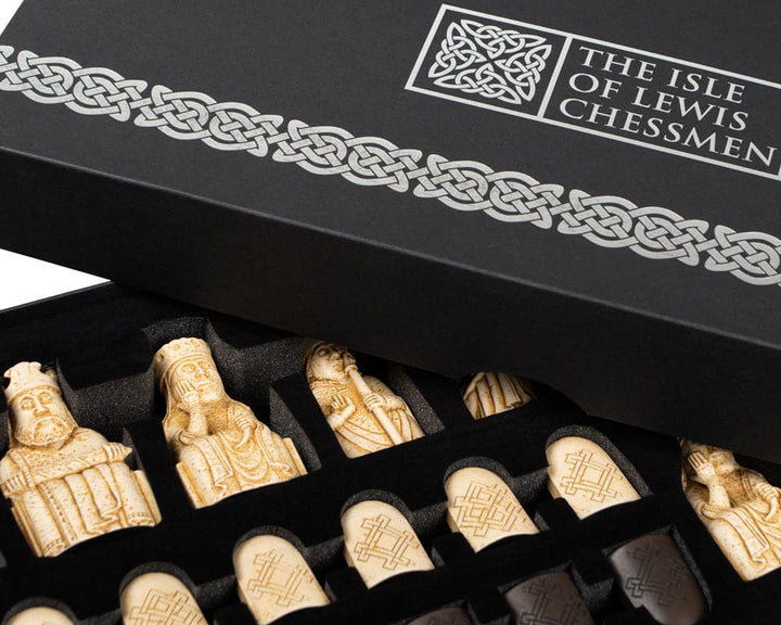 Regency Chess Official Lewis Chessmen Set in gift packaging with intricately detailed pieces crafted from laser scans of the original Isle of Lewis chessmen.