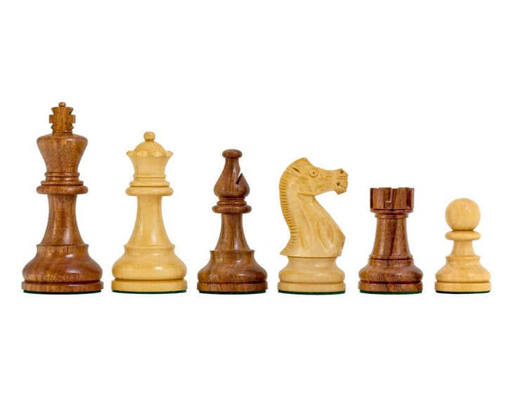 Traditional Staunton design Rochester Ebony Chessmen set with 4 inch king, weighted pieces, and billiard cloth bases for 20 inch boards.