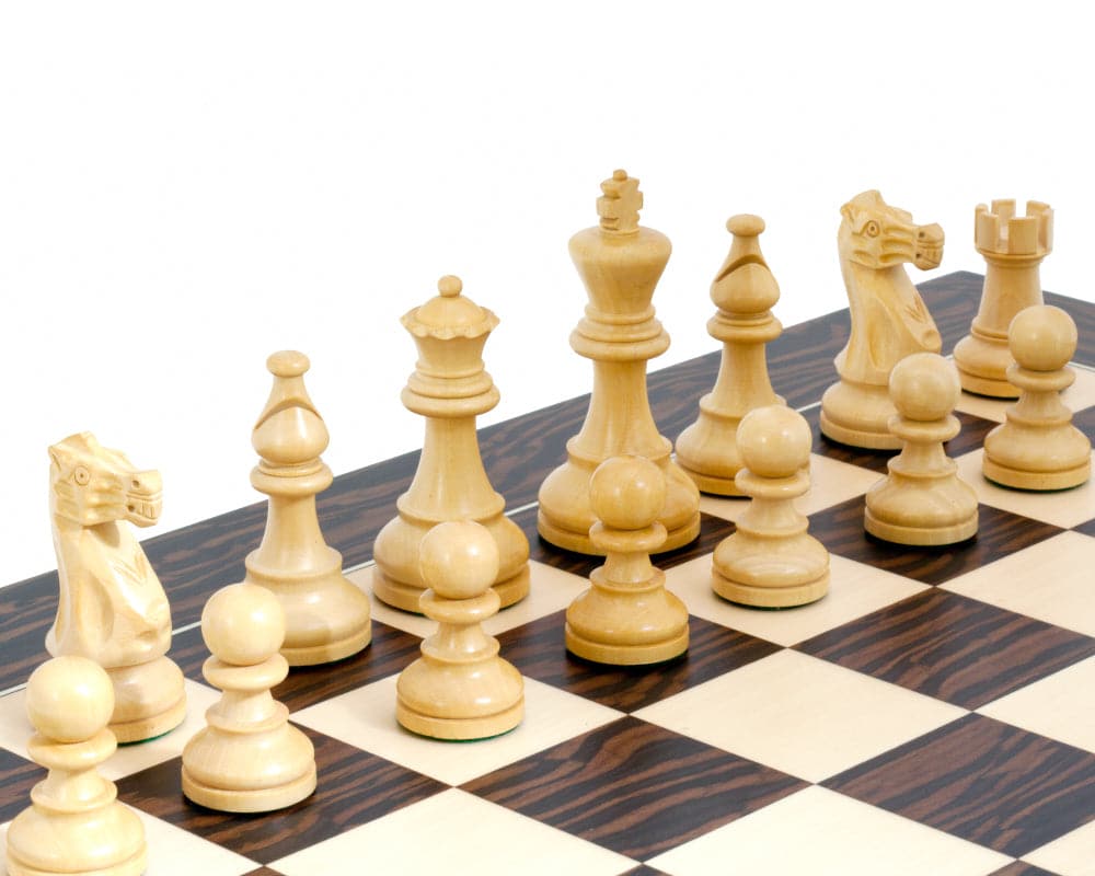 Traditional Staunton design Rochester Ebony Chessmen set on chess board with a 4 inch king and 2 additional queens, crafted by expert artisans