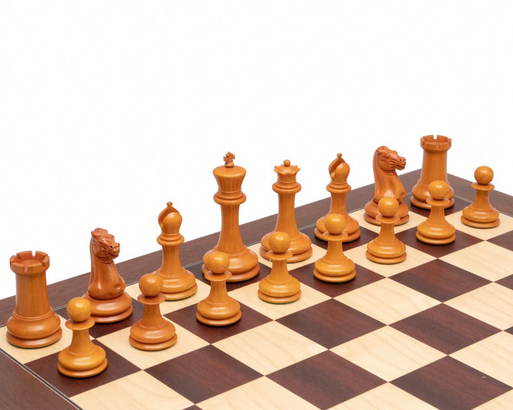 Antique boxwood chess pieces on a wooden chessboard with felted bases and superb craftsmanship, featuring a 4.4-inch king piece.