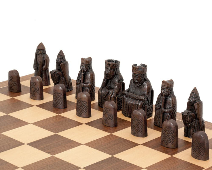 Isle of Lewis Walnut and Maple Chess Set with intricately carved pieces on a checkered board, showcasing elegance and sophistication.