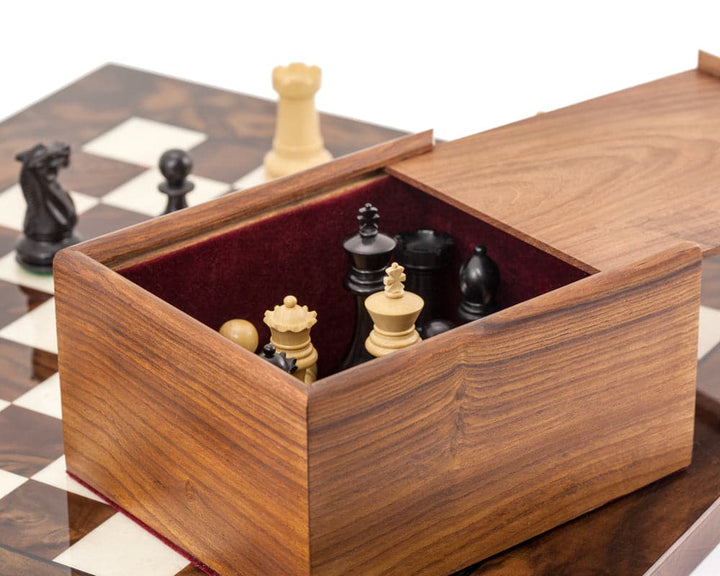 Highclere Ebony and Walnut Luxury Chess Set with Staunton pieces and sheesham storage box on Italian chess board