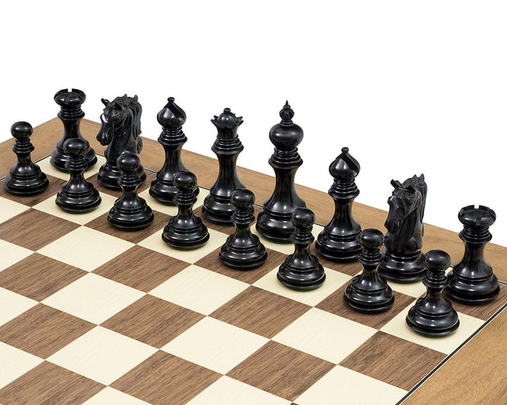 The Cavalry Ebony & Walnut Luxury Chess Set with beautifully crafted knight pieces on a walnut and maple board