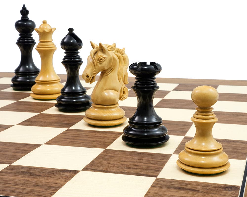 The Cavalry Ebony & Walnut Luxury Chess Set with exquisitely crafted knight pieces on a superb walnut and maple board