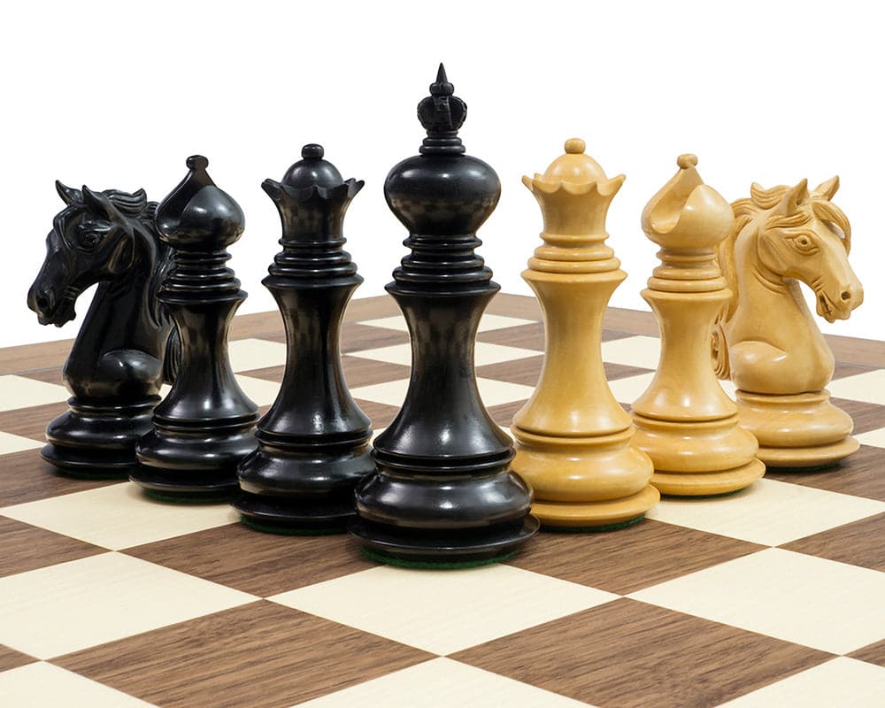 The Cavalry Ebony & Walnut Luxury Chess Set with beautifully crafted knight pieces on walnut and maple board.