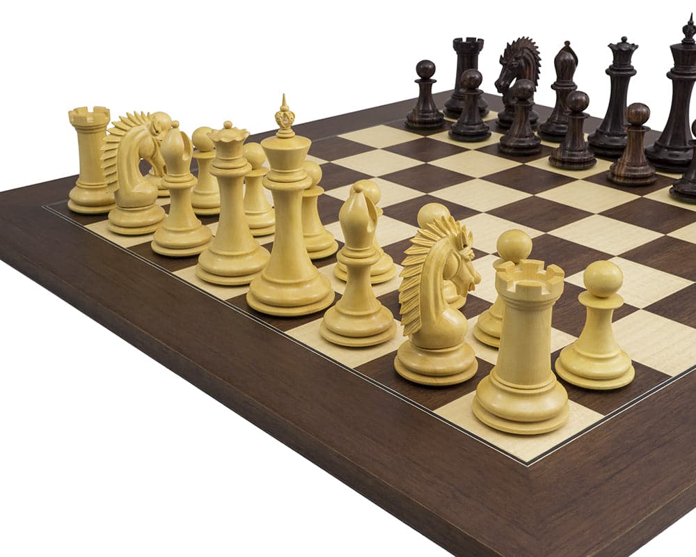 The Sheffield Knight Rosewood Palisander Chess Set on 21.7 inch palisander board with intricately detailed, weighted chess pieces in play.