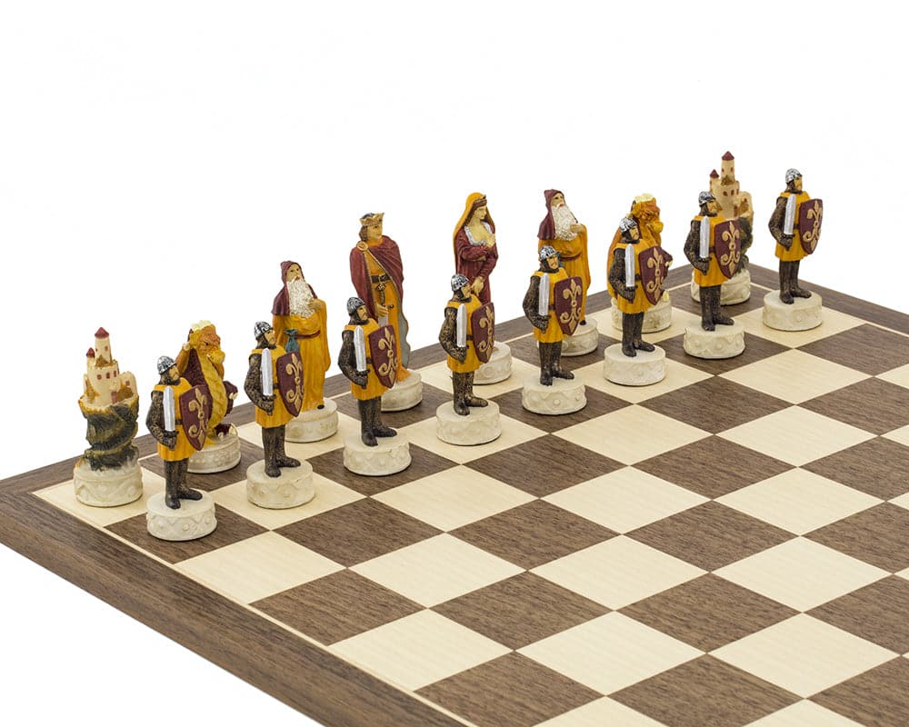 Hand-painted medieval chess set inspired by King Arthur legends, featuring detailed pieces on a beautiful Spanish board.