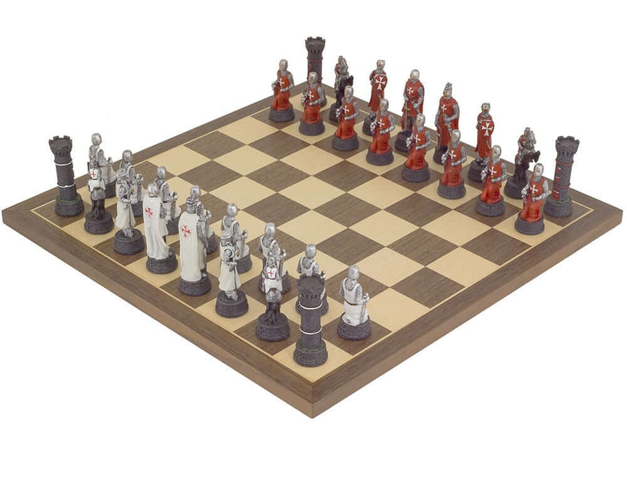 The Crusader Hand Painted Chess Set in medieval theme with intricately detailed pieces on a chessboard, crafted by artisans at Italfama.