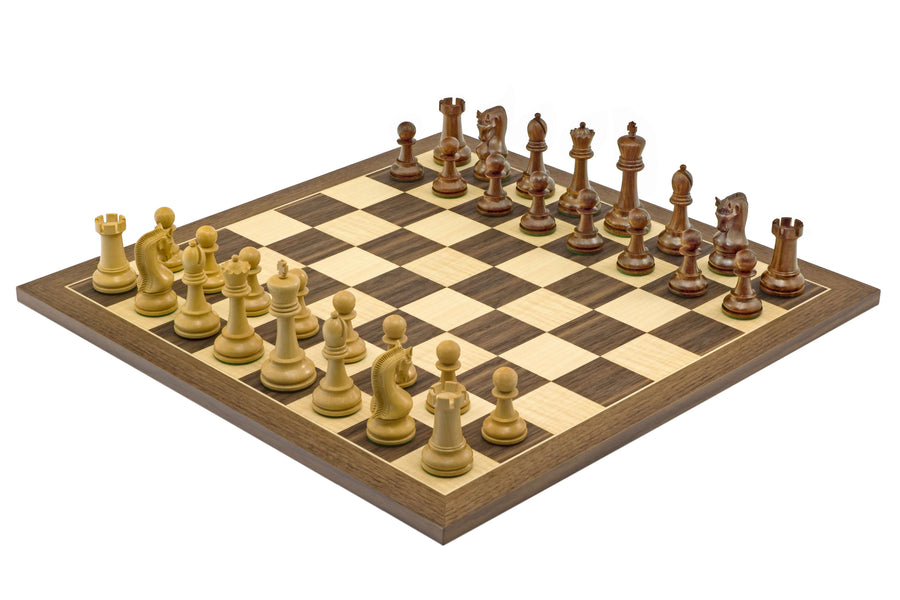 The Leningrad Acacia and Walnut Chess Set with carved pieces on a Walnut and Maple board with 2.17 inch squares.