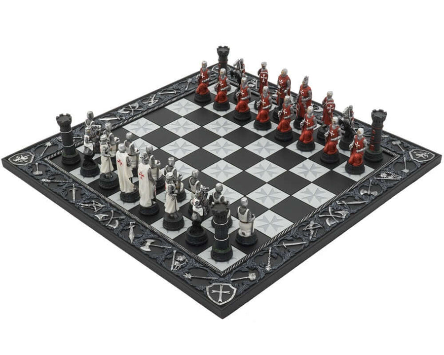 Hand-painted Knights Templar Crusade chess set with detailed medieval border and resin pieces on an intricately sculpted board. Made in Italy.