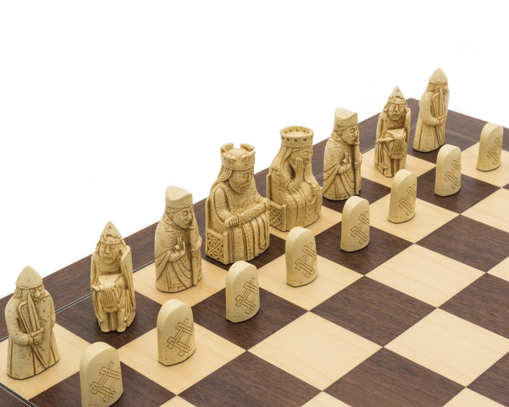 The Isle of Lewis Montgoy Palisander Grand Chess Set with intricately detailed pieces on a 23.6 inch board with 2.5 inch playing squares.